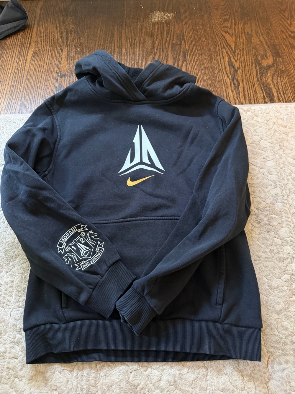 Nike Black Hoodie with White Crest and Gold Swoosh
